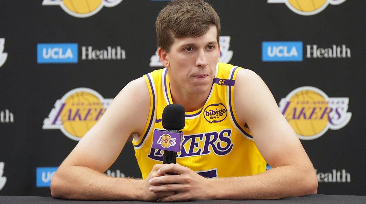  Los Angeles Lakers guard Austin Reaves listens to a question from reporters. Kirby Lee-Imagn Images