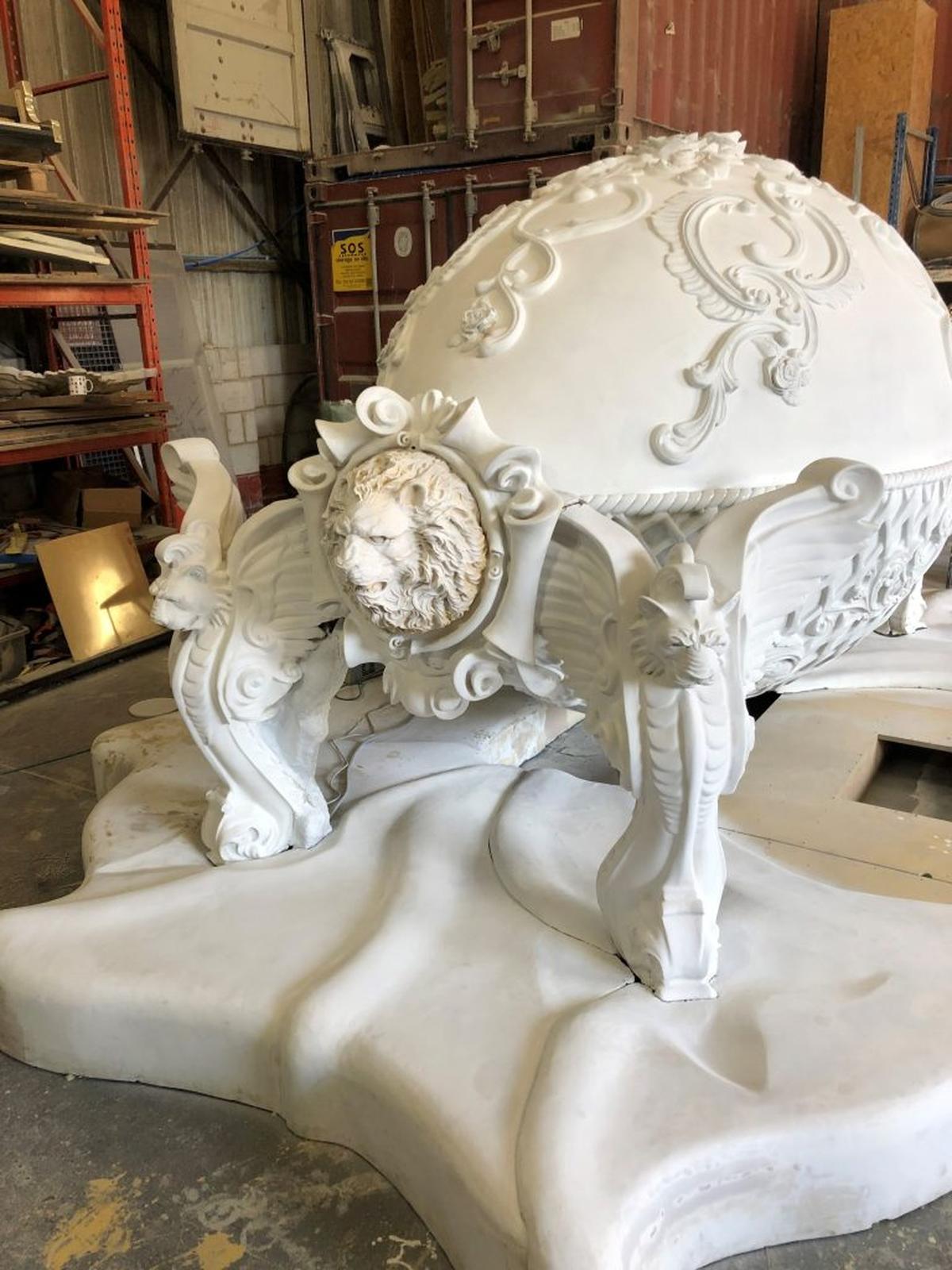  Craftspeople working on the golden piano egg. (Courtesy of goldfinchpianos.com via SWNS) 