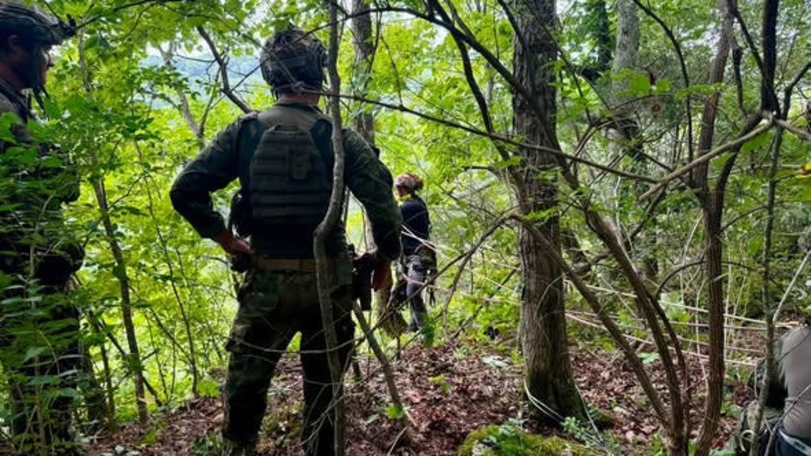 Man arrested by KSP after falling from 40-foot cliff during standoff 