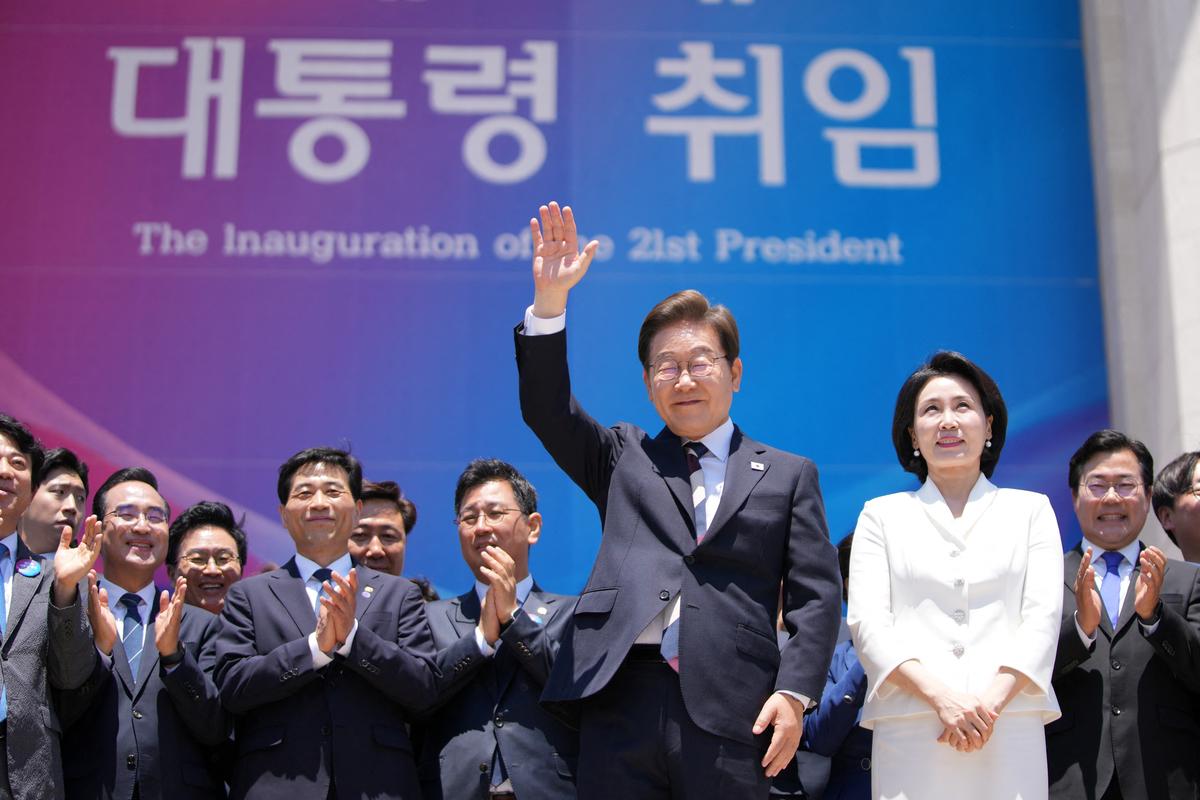 South Korean new President Lee Jae-myung, and his wife Kim Hye-kyung, leave after attending the Presidential Inauguration at the National Assembly in Seoul, South Korea, Wednesday, June 4, 2025.  Lee Jin-man/Pool via REUTERS