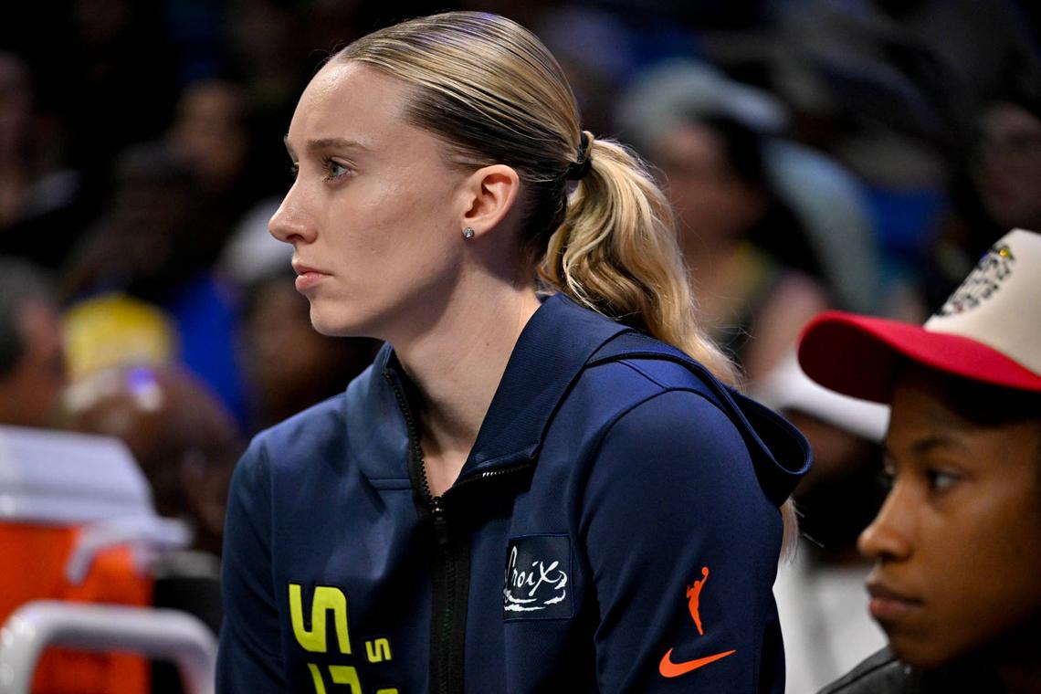  Aug 8, 2025; Arlington, Texas, USA; Dallas Wings guard Paige Bueckers (5) looks on during the first half against the New York Liberty at College Park Center. Credit: Jerome Miron-Imagn Images 