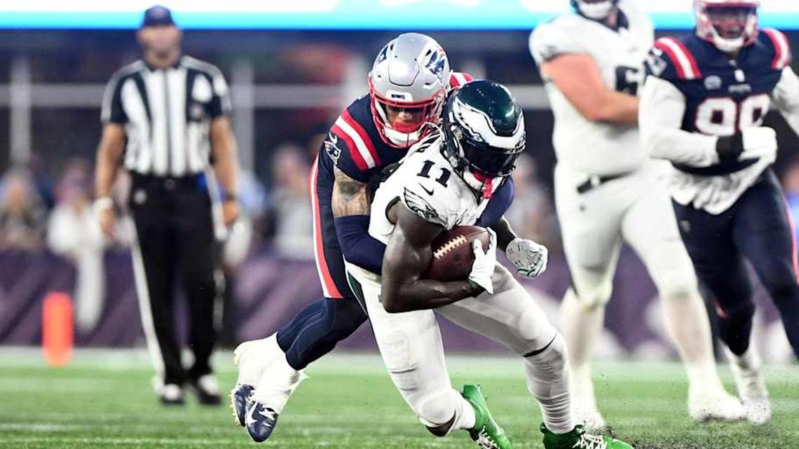  Sep 10, 2023; Foxborough, Massachusetts, USA; Philadelphia Eagles wide receiver A.J. Brown (11) is tackled by New England Patriots cornerback Christian Gonzalez (6) during the second half at Gillette Stadium. Mandatory Credit: Brian Fluharty-Imagn Images | Brian Fluharty-Imagn Images 