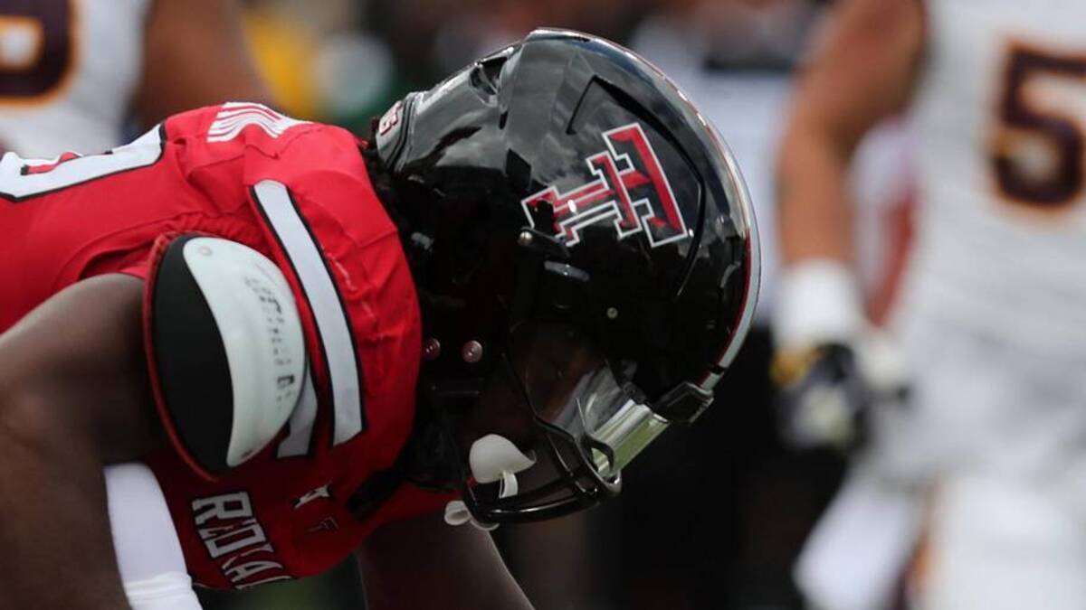  Sep 21, 2024; Lubbock, Texas, USA; Texas Tech Red Raiders defensive back A.J. McCarty (1) and defensive back Amier Washington (88) stop Arizona State Sun Devils quarterback Sam Leavtitt (10) in the first half at Jones AT&T Stadium and Cody Campbell Field. Mandatory Credit: Michael C. Johnson-Imagn Images | Michael C. Johnson-Imagn Images 