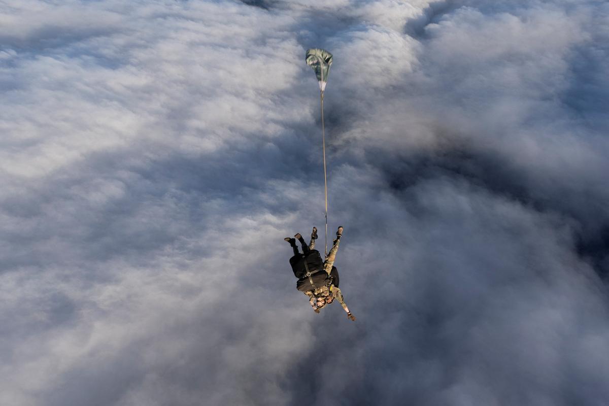 An ICU Nurse and a paratrooper jump from 16 Air Assault Brigade to provide medical support to people , after the UK Health Security Agency (UKHSA) on Friday confirmed one suspected case of Hantavirus of a British national on Tristan da Cunha, Britain, May 9, 2026. AS1 Georgia Callaway/UK MOD Crown/Handout via REUTERS