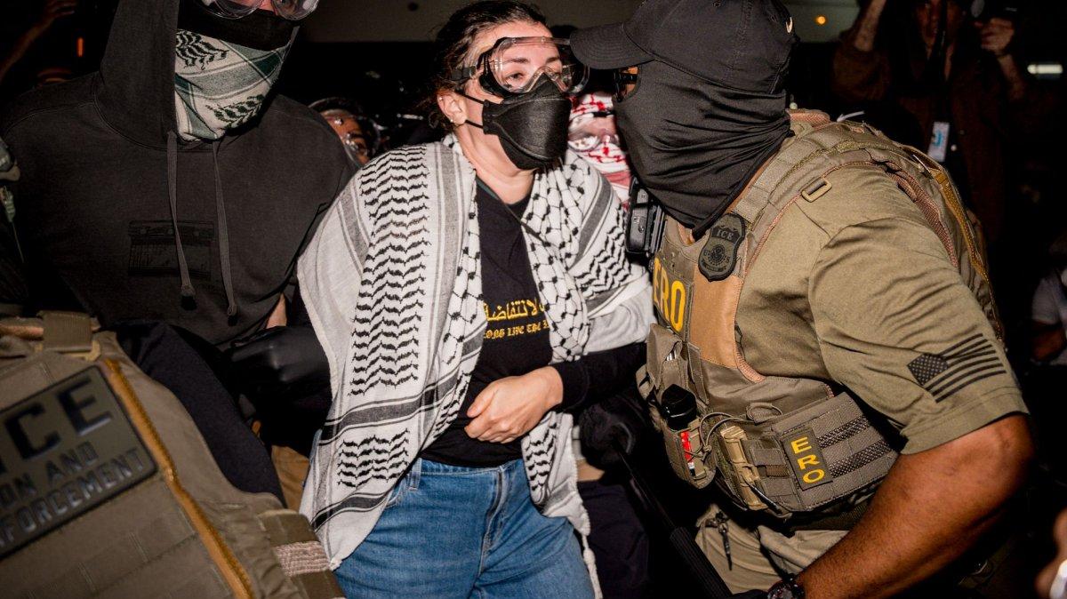 Protestors and federal agents clash Wednesday outside Delaney Hall Detention Center in Newark, N.J. New Jersey's attorney general announced a lawsuit Tuesday seeking access for health officials into the facility. Photo by Angelina Katsanis/UPI