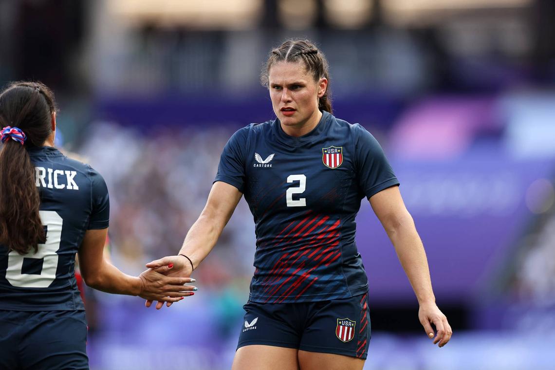  PARIS, FRANCE - JULY 28: Ilona Maher of Team United States  celebrates with teammate Alex Sedrick during the Women's Pool C match between United States and Japan on day two of the Olympic Games Paris 2024 at Stade de France on July 28, 2024 in Paris, France. (Photo by Hannah Peters/Getty Images) 