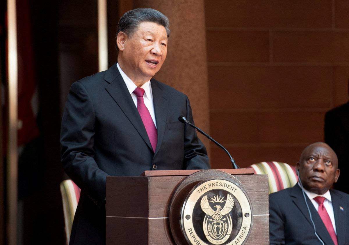 FILE PHOTO: China's President Xi Jinping speaks, as South Africa's President Cyril Ramaphosa listens, at the Union Buildings ahead of the opening remarks of the BRICS emerging economies meeting, in Pretoria, South Africa August 22, 2023. REUTERS/Alet Pretorius/File Photo