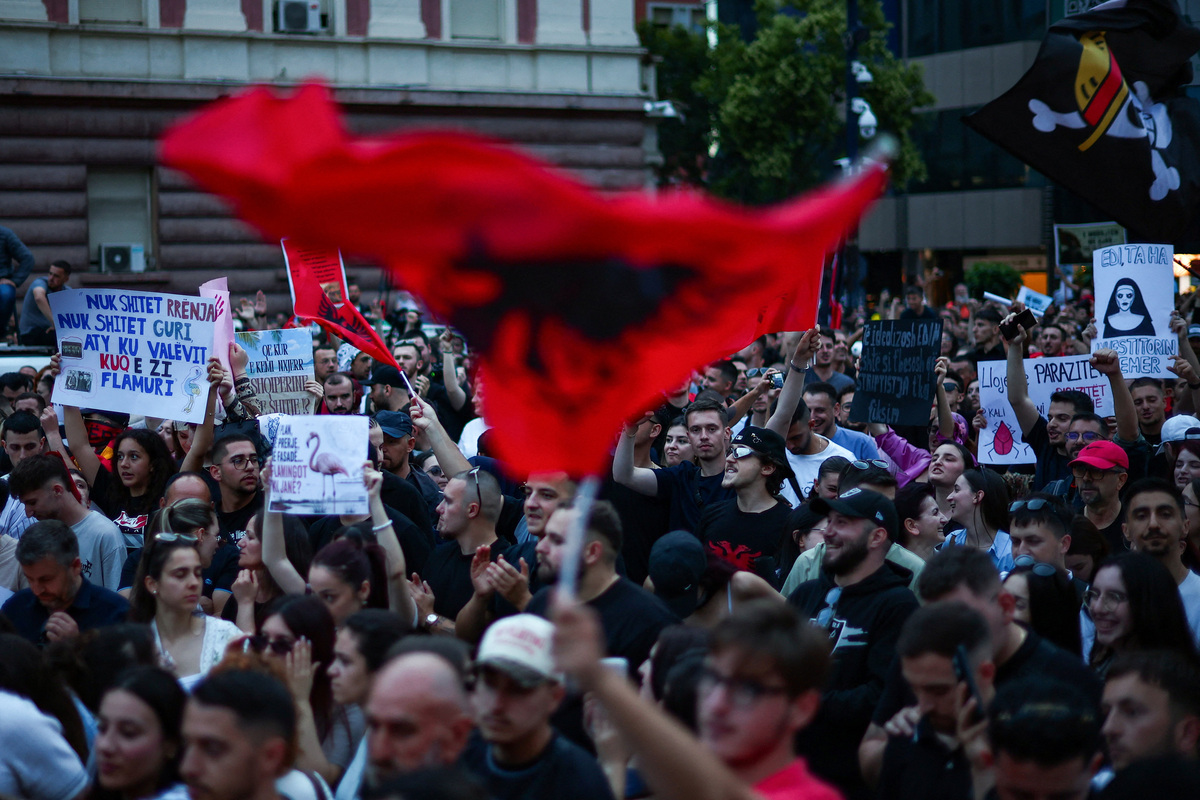Protesters hold banners during a protest against a luxury resort development planned by a company linked with Donald Trump's son-in-law, Jared Kushner, on an environmentally sensitive part of the Adriatic coast, in Tirana, Albania, June 4, 2026. REUTERS/Florion Goga