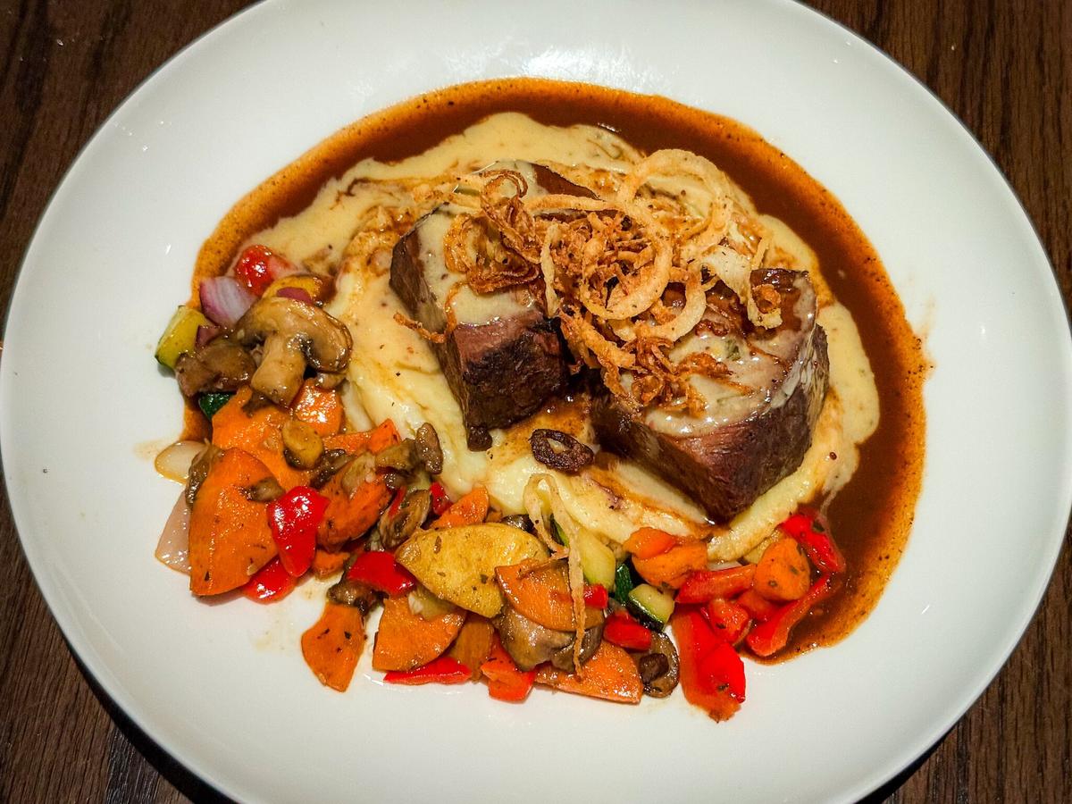 The red wine-braised short ribs dish is shown here from a Cooper’s Hawk location near Atlanta.