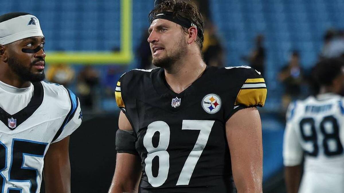  Aug 21, 2025; Charlotte, North Carolina, USA; Carolina Panthers cornerback Michael Reid (35) chats with Pittsburgh Steelers tight end JJ Galbreath (87) after the second half at Bank of America Stadium. Mandatory Credit: Allison Lawhon-Imagn Images | Allison Lawhon-Imagn Images 