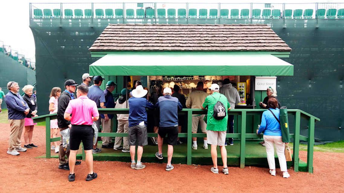  Small on-course stands at the Masters are a quicker option for basic souvenirs than massive lines at the main merchandise shops. | Rob Schumacher, Rob Schumacher / USA TODAY NETWORK 