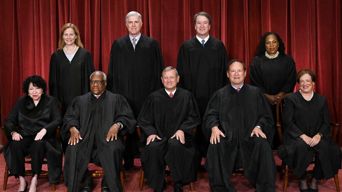 Justices of the US Supreme Court pose for their official photo at the Supreme Court in Washington, D.C., on Oct. 7, 2022. Seated from left: Associate Justice Sonia Sotomayor, Associate Justice Clarence Thomas, Chief Justice John Roberts, Associate Justice Samuel Alito and Associate Justice Elena Kagan. Standing behind from left: Associate Justice Amy Coney Barrett, Associate Justice Neil Gorsuch, Associate Justice Brett Kavanaugh and Associate Justice Ketanji Brown Jackson.