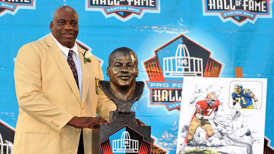  Aug 2, 2008; Canton, OH, USA; Fred Dean poses with his bust at the Pro Football Hall of Fame enshrinement at Fawcett Stadium. Mandatory Credit: Kirby Lee/Image of Sport-Imagn Images | Kirby Lee-Imagn Images 