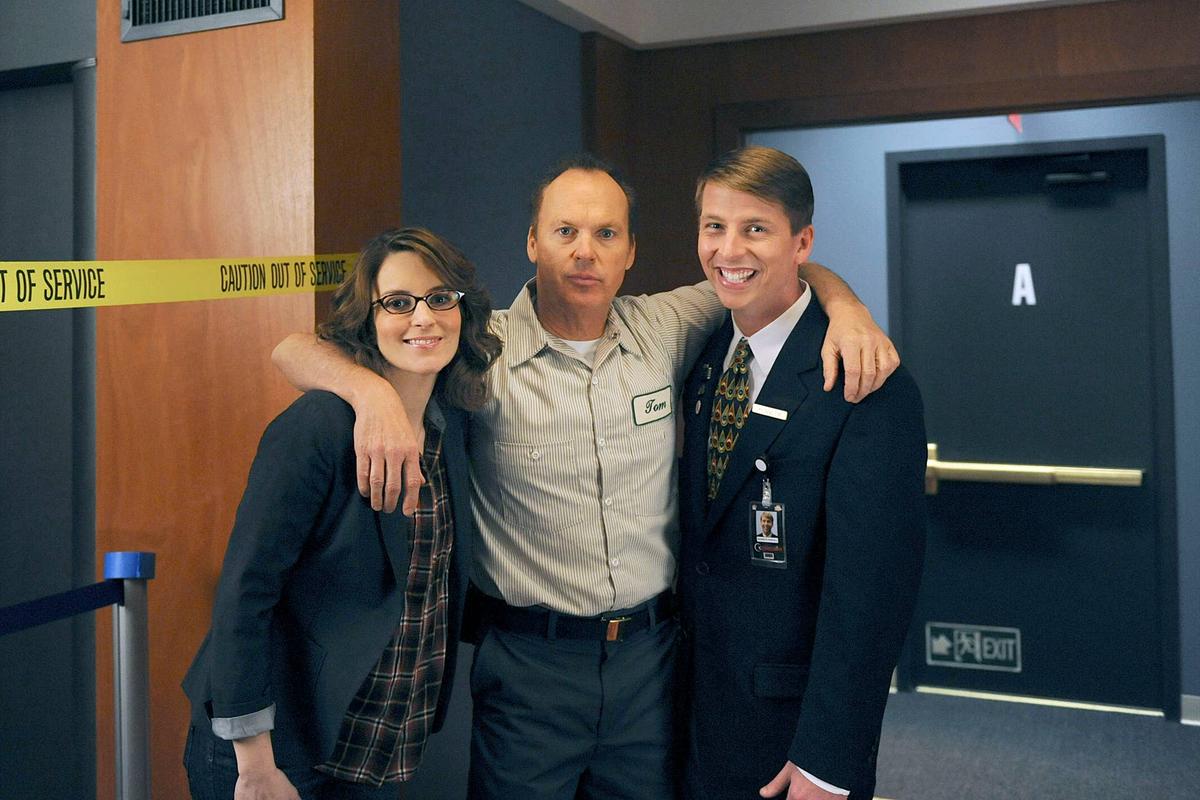  Tina Fey as Liz Lemon, Michael Keaton as Tom, and Jack McBrayer as Kenneth on the 30 Rock episode "100.".
