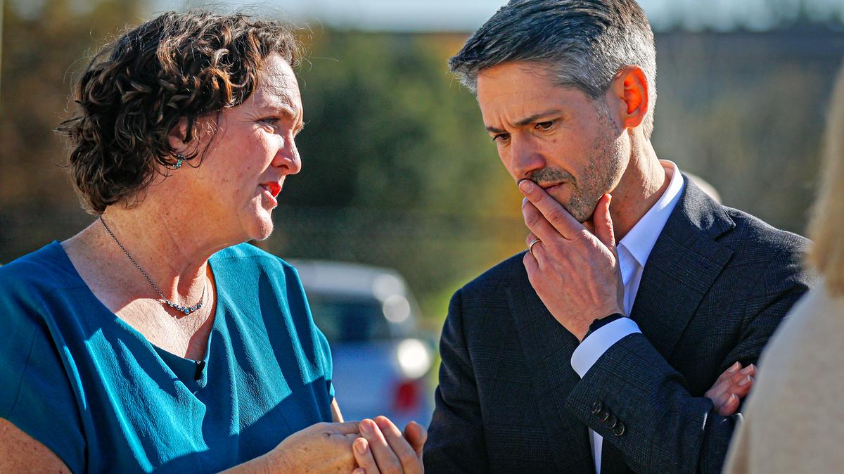 San Jose Mayor Matt Mahan, right, speaks to Katie Porter, former United States Representative, at Cherry Avenue Interim Housing Community in San Jose, Calif., on Friday, Dec. 5, 2025. (Shae Hammond/Bay Area News Group)