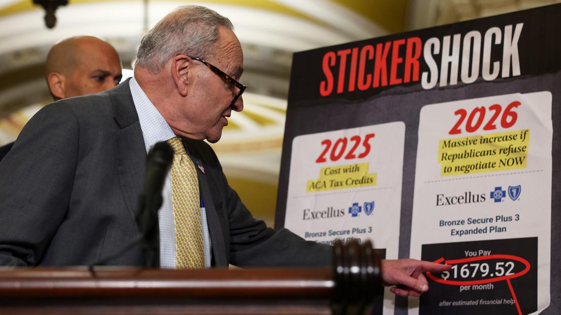 U.S. Senate Minority Leader Chuck Schumer (D-NY) points to a display during a news conference following a weekly Democratic policy luncheon on Capitol Hill on Oct. 15, 2025, in Washington, D.C.  (Anna Moneymaker/Getty Images/TNS)