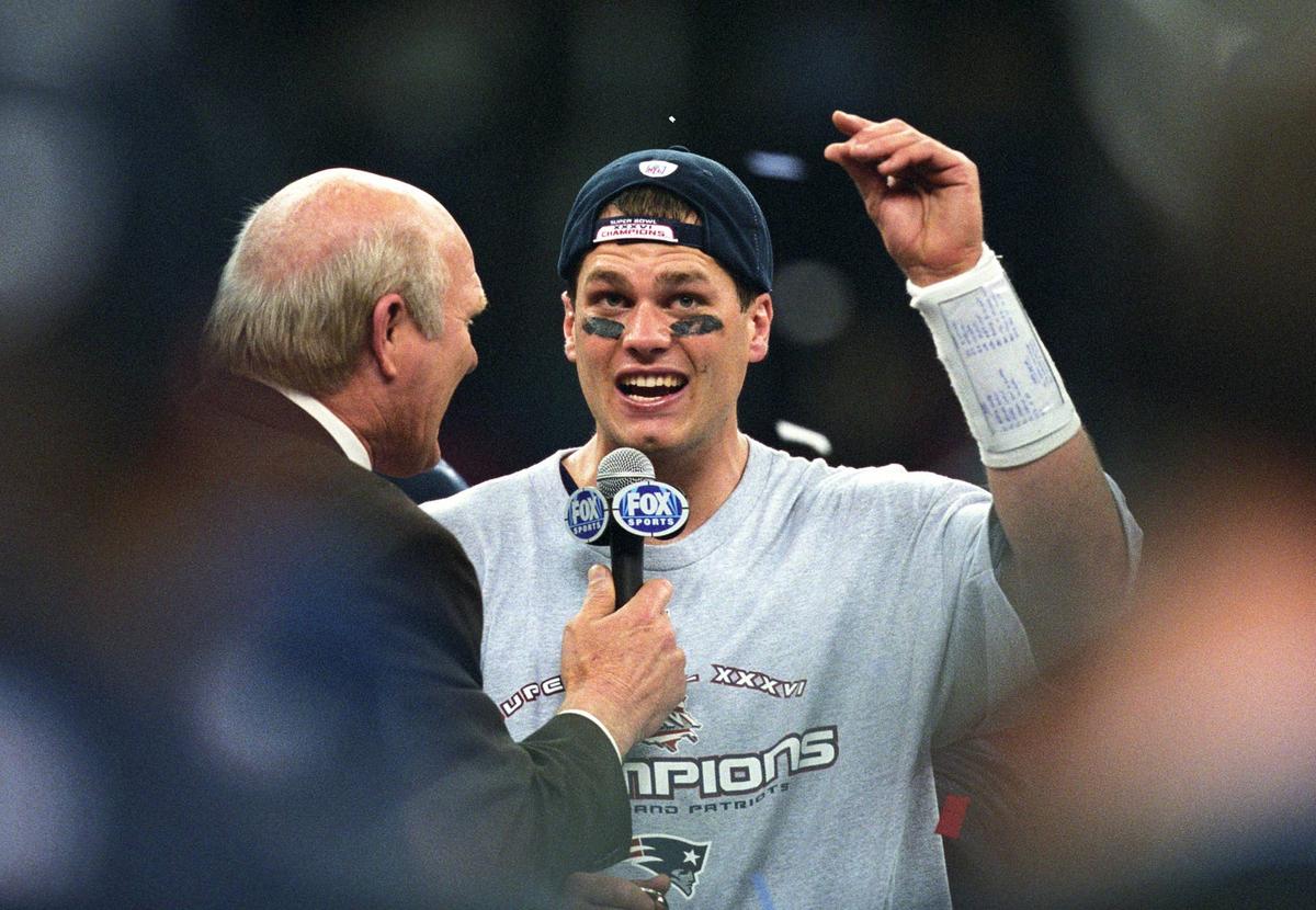  New England Patriots quarterback Tom Brady talks with Fox broadcaster Terry Bradshaw after winning Super Bowl XXXVI against the St. Louis Rams at the Louisiana Superdome. USA TODAY Sports via Imagn Images