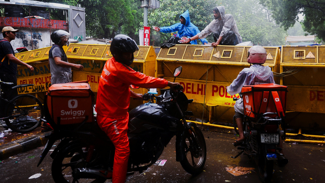 Food, fury and supporters near and far keep India protest alive 