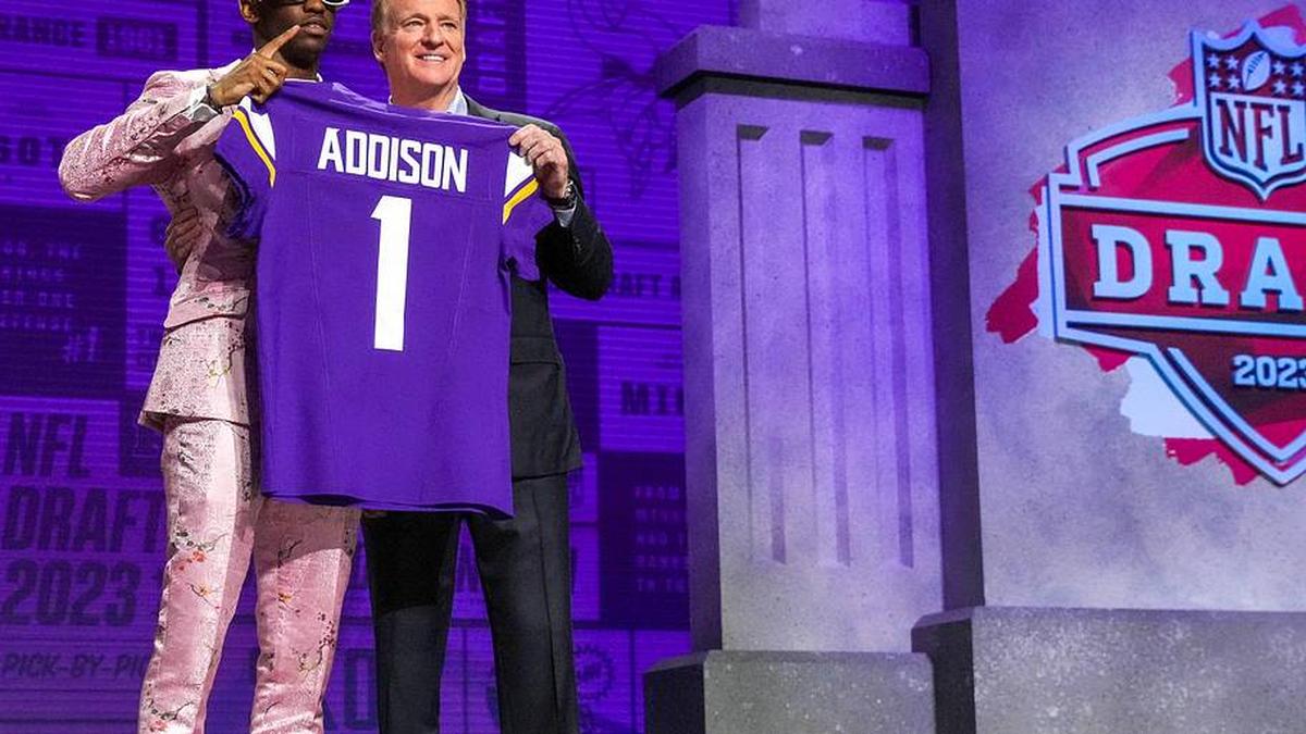  Apr 27, 2023; Kansas City, MO, USA; USC wide receiver Jordan Addison with NFL commissioner Roger Goodell after being selected by the Minnesota Vikings twenty third overall in the first round of the 2023 NFL Draft at Union Station. Mandatory Credit: Kirby Lee-Imagn Images | Kirby Lee-Imagn Images 