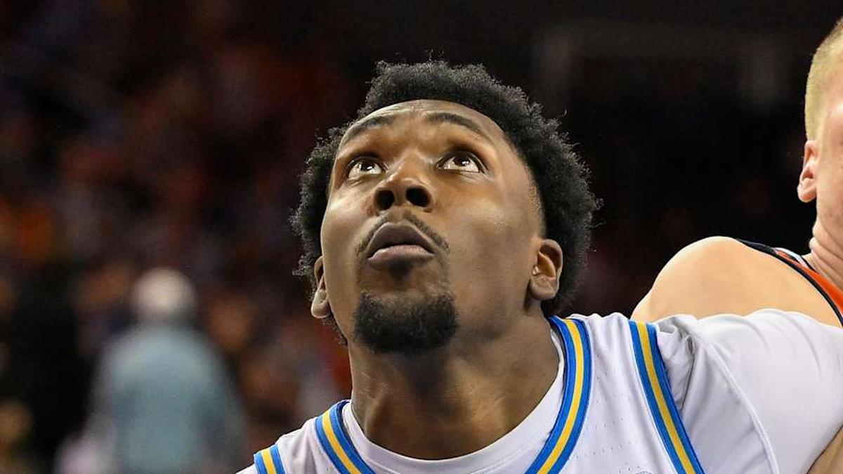  Feb 21, 2026; Los Angeles, California, USA; UCLA forward Xavier Booker (1) tangles up with Illinois forward Ben Humrichous (3) under the basket during the second half at Pauley Pavilion presented by Wescom Financial. Mandatory Credit: Robert Hanashiro-Imagn Images | Robert Hanashiro-Imagn Images 