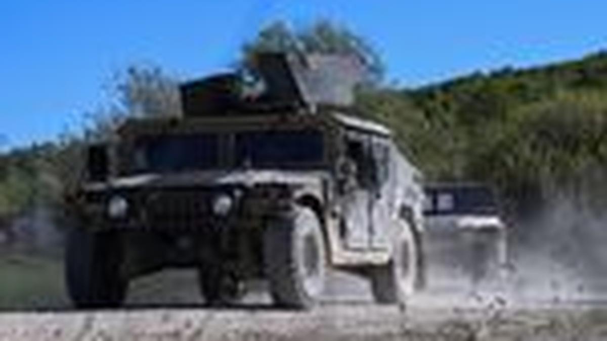 Military vehicles drive during the U.S. Army Combined Resolve exercise at the U.S. Army's southern Germany training facilities in Hohenfels, Germany, April 30, 2026. REUTERS/Angelika Warmuth