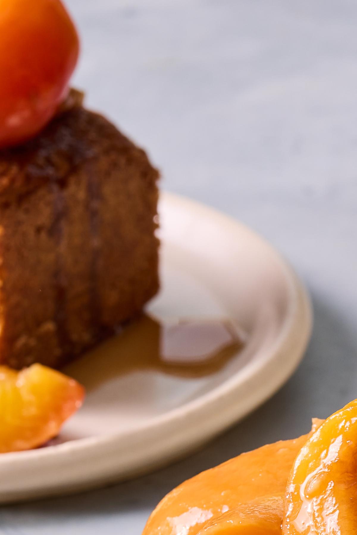 Edna Lewis's busy day cake topped with her brandied peaches. The Virginia chef and writer's pioneering 'Taste of Country Cooking' continues to inspire. Food Stylist: Rebecca Jurkevich. (Christopher Testani/The New York Times)