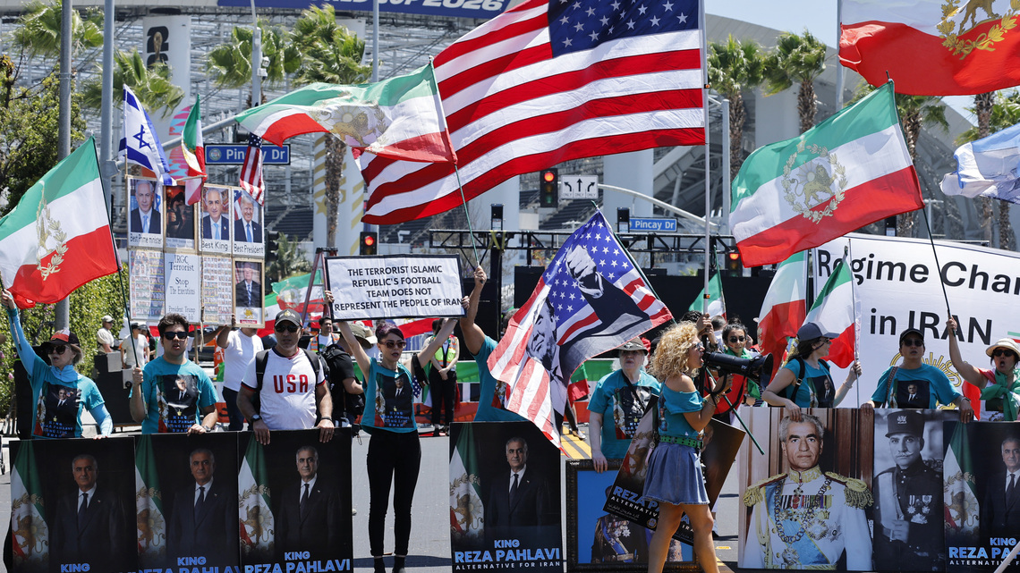 Some Iranian Americans wave protest flags, others cheer as Iran play World Cup opener