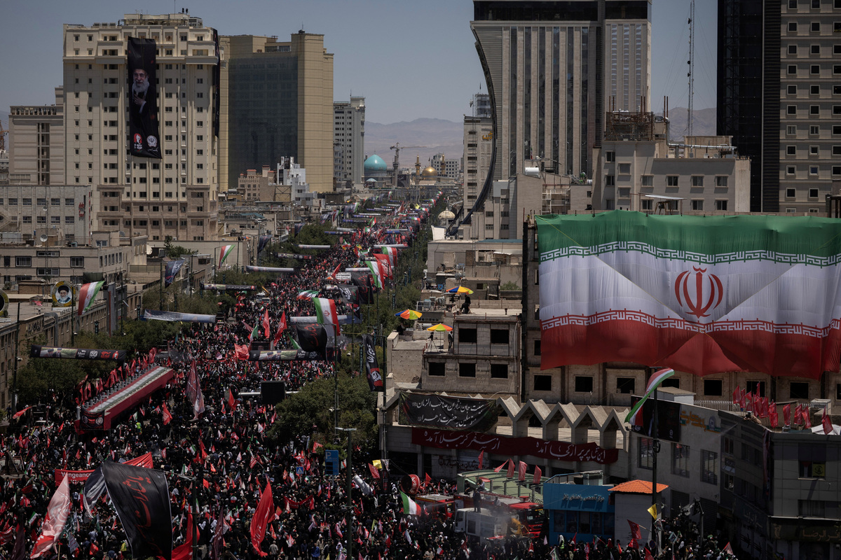 Mourners attend a funeral procession on the day of the burial of Iran's late Supreme Leader Ayatollah Ali Khamenei, who was killed on February 28 in Israeli and U.S. airstrikes, in Mashhad, Iran, July 9, 2026. REUTERS/Alkis Konstantinidis
