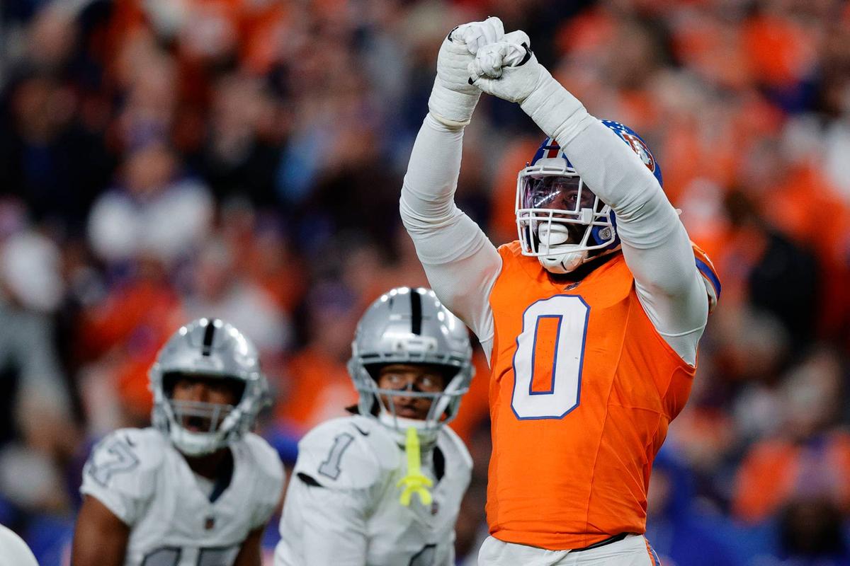 Nov 6, 2025; Denver, Colorado, USA; Denver Broncos linebacker Jonathon Cooper (0) reacts against the Las Vegas Raiders during the first half at Empower Field at Mile High. Mandatory Credit: Isaiah J. Downing-Imagn Images 