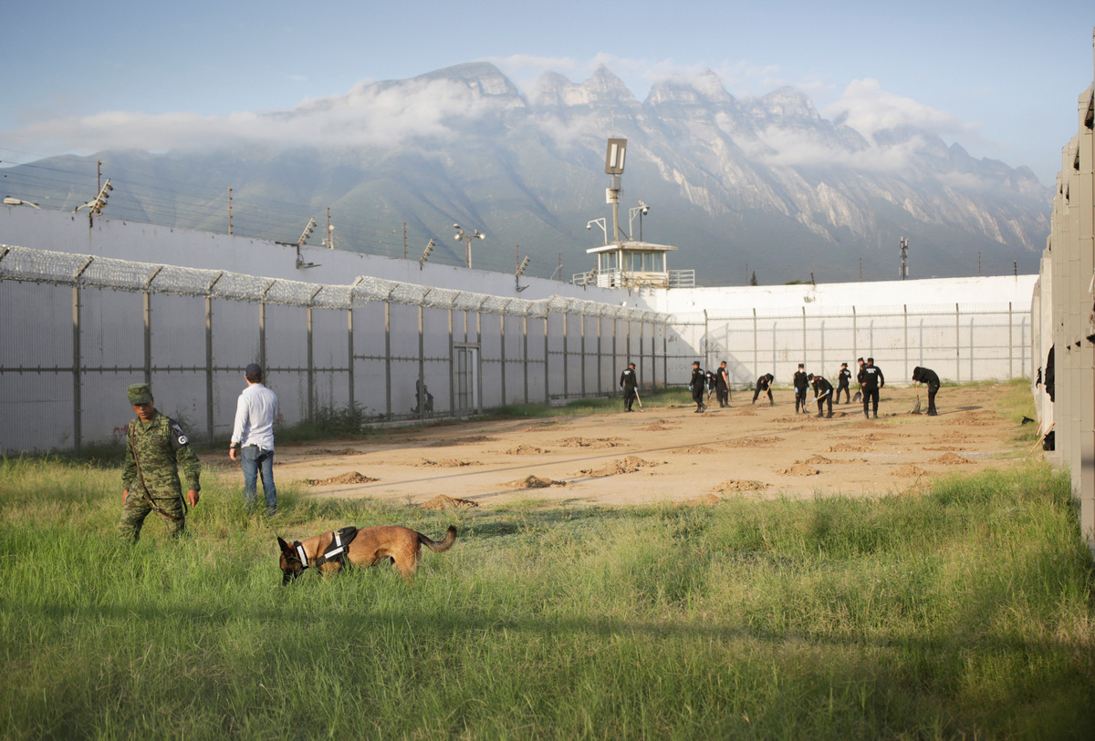 Mexican authorities take part in a search for mass graves inside the Topo Chico prison after being closed and before it was converted into Liberty Park, in Monterrey, Mexico October 8, 2019. REUTERS/Daniel Becerril