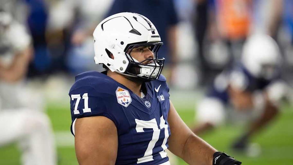  Dec 31, 2024; Glendale, AZ, USA; Penn State Nittany Lions offensive lineman Olaivavega Ioane (71) against the Boise State Broncos during the Fiesta Bowl at State Farm Stadium. Mandatory Credit: Mark J. Rebilas-Imagn Images | Mark J. Rebilas-Imagn Images 