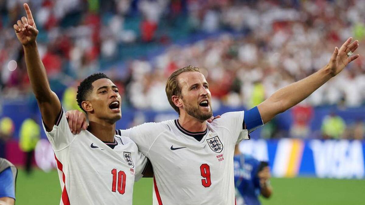 England's Jude Bellingham and Harry Kane celebrate after qualifying for the semifinals of the World Cup. 