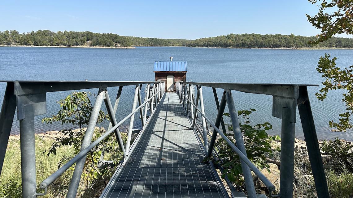 A metal gangway leads to the floating pumphouse used to harvest water for Public Wholesale Water Supply District 20 outside Sedan, Kan. A new analysis found agricultural states including Kansas have seen drinking water systems record thousands of instances of elevated nitrate, a potentially dangerous byproduct of farming.
