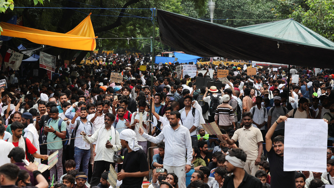 India's Modi promises fast-track courts on exam leaks, protesters want minister to quit 