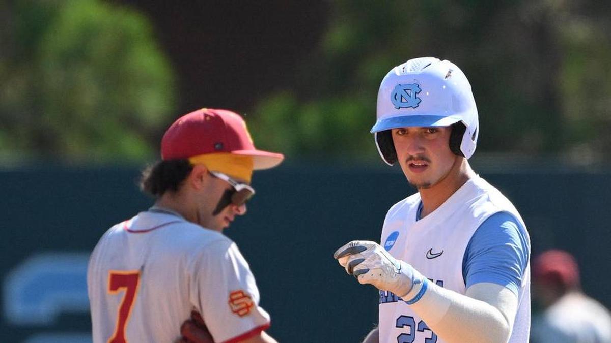  Jun 5, 2026; Chapel Hill, NC, USA; North Carolina Tar Heels catcher Colin Hynek (23) reacts after making it to second base against the USC Trojans in the fourth inning at Boshamer Stadium. Mandatory Credit: Zachary Taft-Imagn Images | Zachary Taft-Imagn Images 