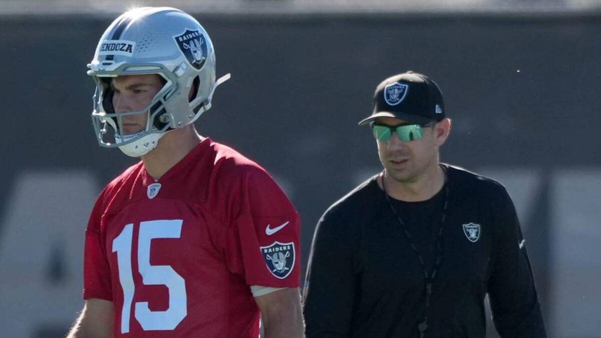  Jun 9, 2026; Henderson, NV, USA; Las Vegas Raiders quarterback Fernando Mendoza (15) and coach Klint Kubiak during minicamp at Intermountain Health Performance Center. Mandatory Credit: Kirby Lee-Imagn Images | Kirby Lee-Imagn Images 