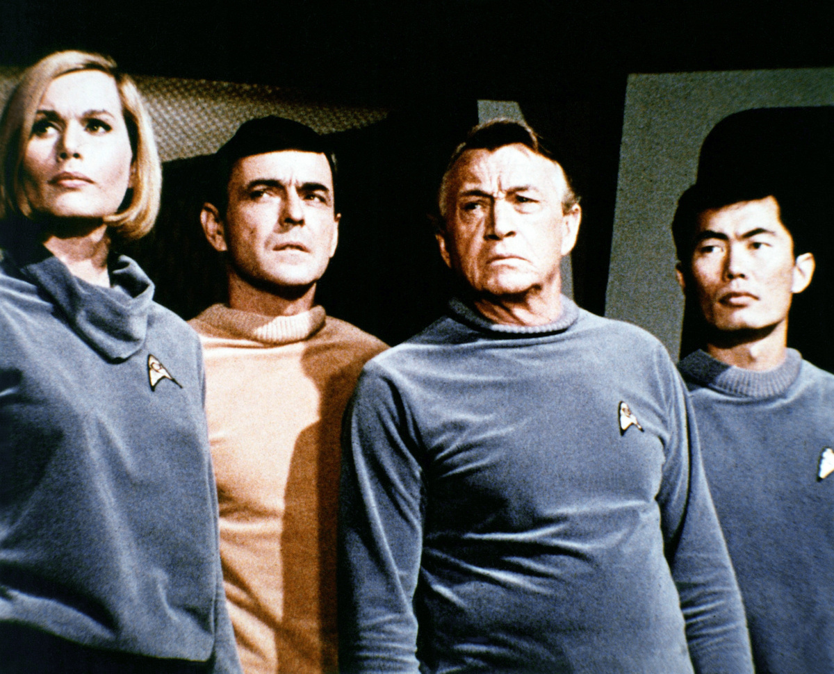 STAR TREK, Sally Kellerman (left), James Doohan, Paul Fix (2nd from right), George Takei (right), ‘Where No Man Has Gone Before’, (Season 1, ep. 103, aired Sept. 22, 1966), 1966-69.Courtesy the Everett Collection