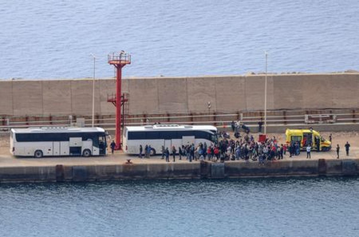Activists of the Global Sumud Flotilla, which was intercepted on international waters by the Israeli Navy, prepare to board buses, at the port of Atherinolakkos, on the island of Crete, Greece, May 1, 2026. REUTERS/Stefanos Rapanis