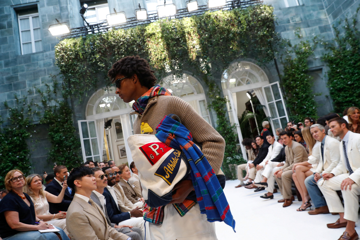 A model wears a creation during Ralph Lauren's presentation of its Spring/Summer 2027 men's collection in Milan, Italy, June 19, 2026 REUTERS/Alessandro Garofalo