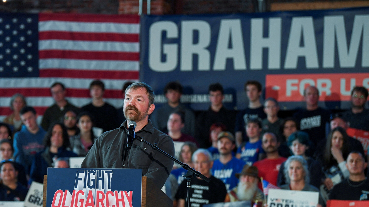 FILE PHOTO: Graham Platner, Democratic candidate for U.S. Senate in Maine, speaks during a "Fighting Oligarchy" campaign rally with U.S. Senator Bernie Sanders (I-VT) in Portland, Maine, U.S., May 25, 2026.   REUTERS/Amanda Sabga/File Photo