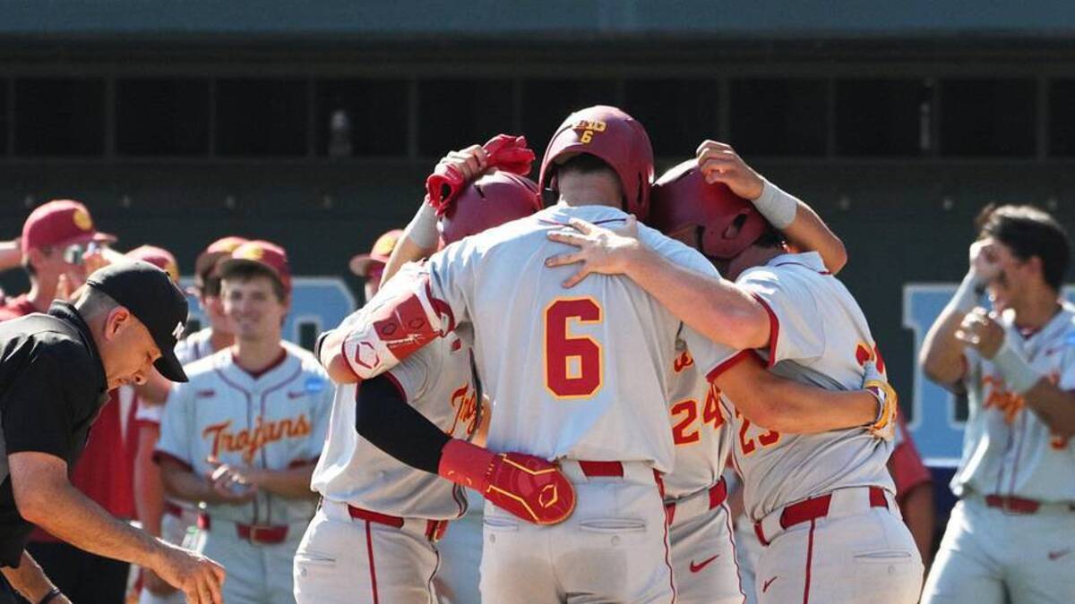  Jun 5, 2026; Chapel Hill, NC, USA; The USC Trojans celebrate a grand slam by USC infielder Dean Carpentier (6) against the North Carolina Tar Heels in the sixth inning at Boshamer Stadium. Mandatory Credit: Zachary Taft-Imagn Images | Zachary Taft-Imagn Images 