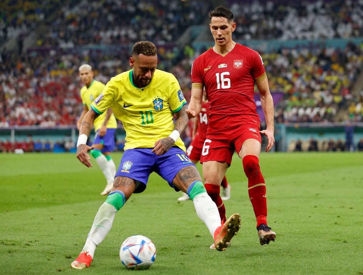  Brazil forward Neymar (10) kicks the ball during the 2022 World Cup at Lusail Stadium. Yukihito Taguchi-USA TODAY Sports