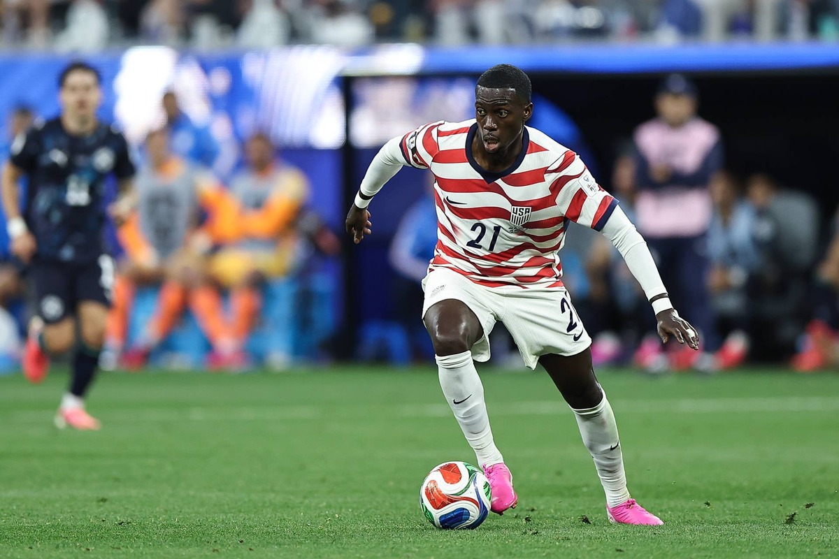  Timothy Weah #21 of the United States drives the ball during the FIFA World Cup 2026 Group D match between USA and Paraguay at Los Angeles Stadium on June 12, 2026 in Inglewood, California. (Photo by Omar Vega/Getty Images) Photo by Omar Vega/Getty Images