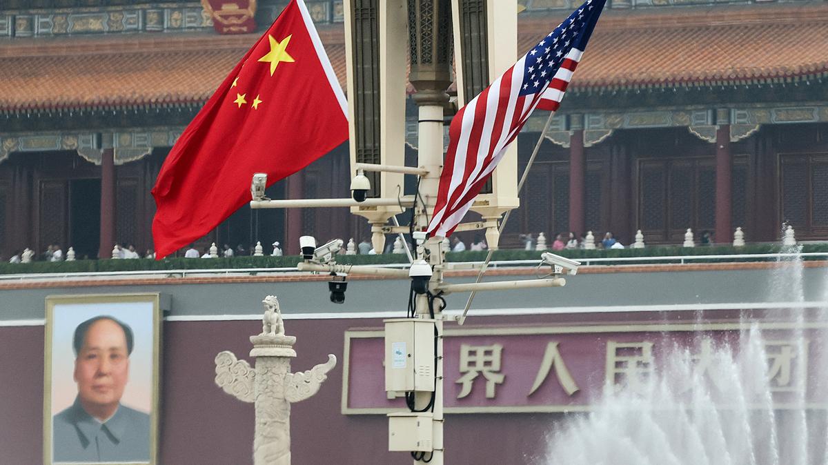 U.S. and China’s national flags flutter next to the Tiananmen Gate featuring a portrait of China’s late Chairman Mao Zedong, during U.S. President Donald Trump's visit to China, in Beijing, China, May 15, 2026. REUTERS/Maxim Shemetov