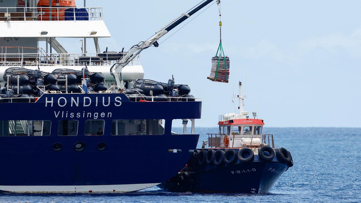 The cruise ship MV Hondius, affected by a hantavirus outbreak, receives a delivery at the port of Granadilla de Abona, Tenerife, Spain May 11, 2026. REUTERS/Borja Suarez