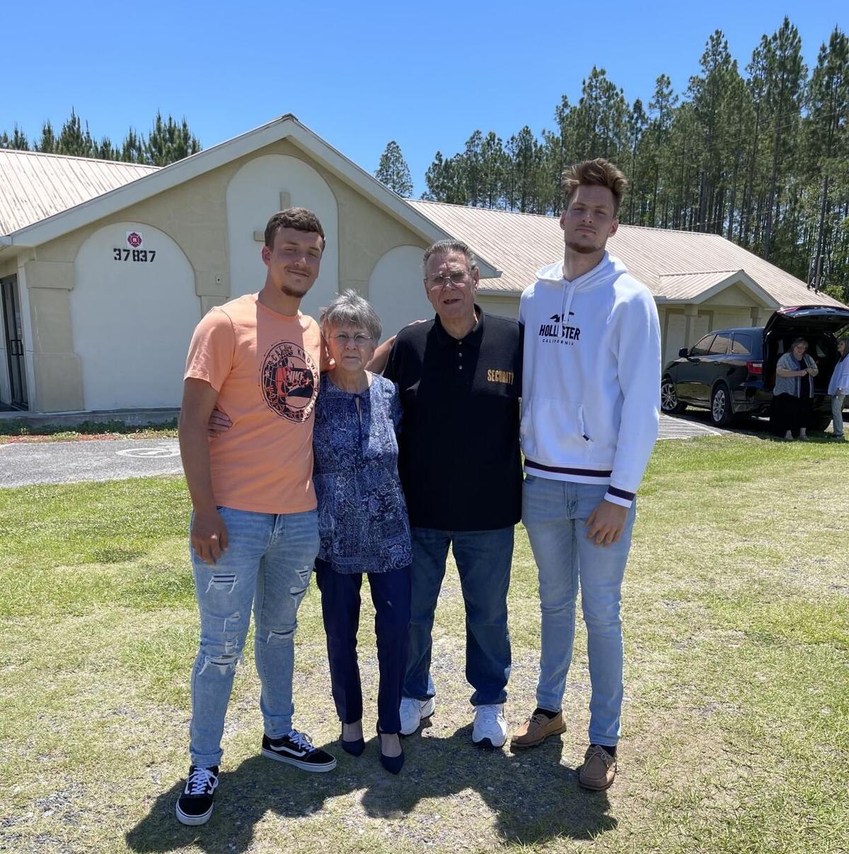 Mizzou forward Jacob Crews poses with his grandparents and younger brother. Crews and his brother were raised by his grandparents in Hilliard, Florida. 
