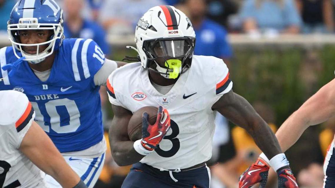  Nov 15, 2025; Durham, North Carolina, USA; Virginia Cavaliers running back J'Mari Taylor (3) runs the ball during the first quarter against the Duke Blue Devils at Wallace Wade Stadium. Mandatory Credit: Zachary Taft-Imagn Images | Zachary Taft-Imagn Images 