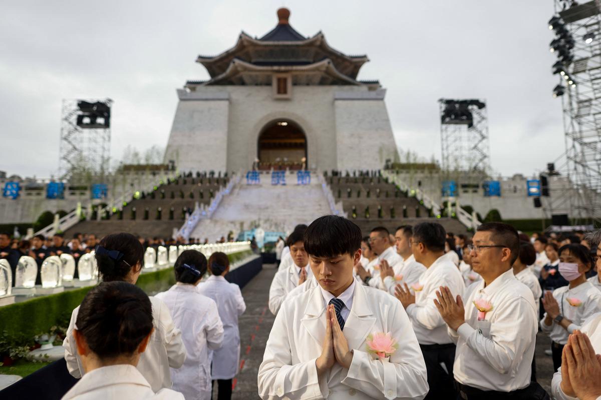 Buddhist Tzu Chi Foundation members commemorate the organization’s 60th anniversary during an annual Buddha bathing ceremony marking Buddha’s birthday, Mother’s Day and Global Tzu Chi Day at Chiang Kai-shek Memorial Hall in Taipei, Taiwan, May 10, 2026. REUTERS/Ann Wang