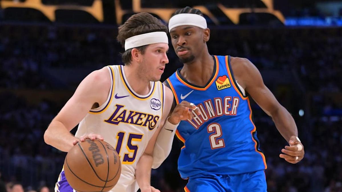  May 9, 2026; Los Angeles, California, USA; Los Angeles Lakers guard Austin Reaves (15) is defended by Oklahoma City Thunder guard Shai Gilgeous-Alexander (2) in the first half of game three of the second round of the 2026 NBA Playoffs at Crypto.com Arena. Mandatory Credit: Jayne Kamin-Oncea-Imagn Images | Jayne Kamin-Oncea-Imagn Images 
