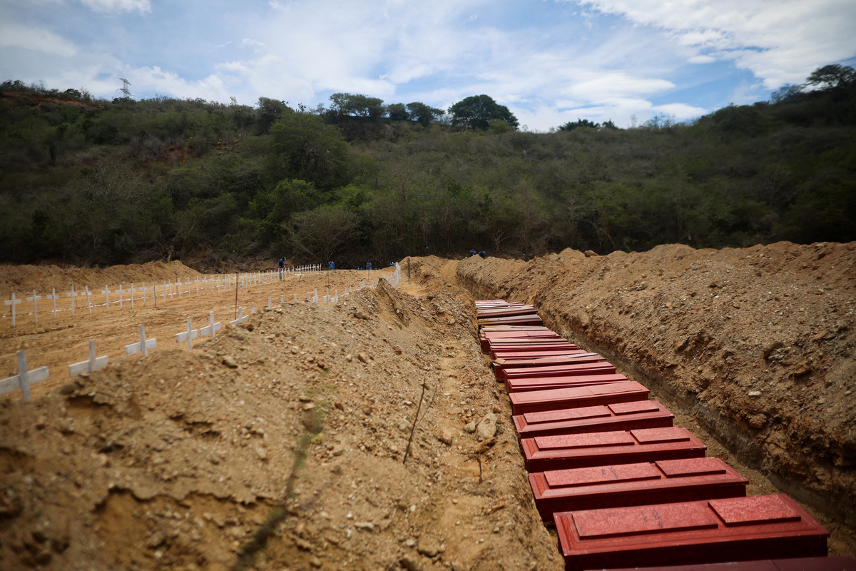 A view of coffins on the day of the burial of earthquake victims, in the aftermath of the June 24 earthquakes, at La Esperanza Cemetery, in La Guaira, Venezuela, July 6, 2026. REUTERS/Adriano Machado